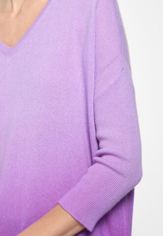 Pull-over include en violet