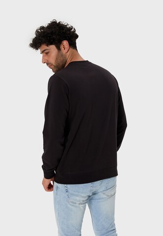 Oldskull Sweatshirt 'Retro Tokyopolis' in Zwart