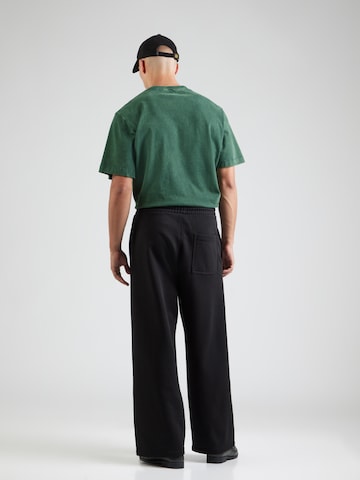 WEEKDAY Loosefit Housut värissä musta