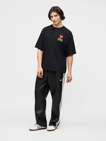 Tricou 'V-Day Heart Broken Cat' de la ADIDAS ORIGINALS pe negru