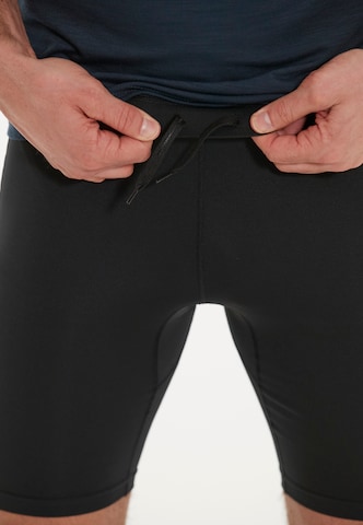 Regular Pantaloni sport de la ENDURANCE pe negru