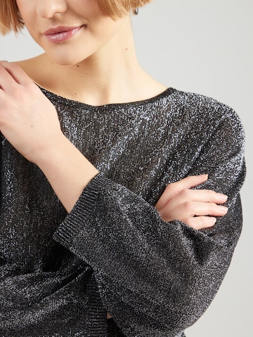 Pulover de la QS pe negru