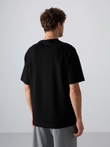 Tommy Life T-Shirts in Schwarz