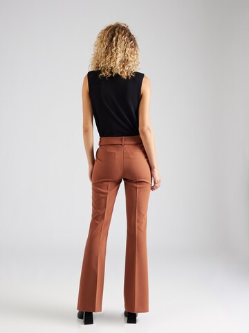 ABOUT YOU x Iconic by Tatiana Kucharova Flared Trousers with creases 'Farina' in Brown