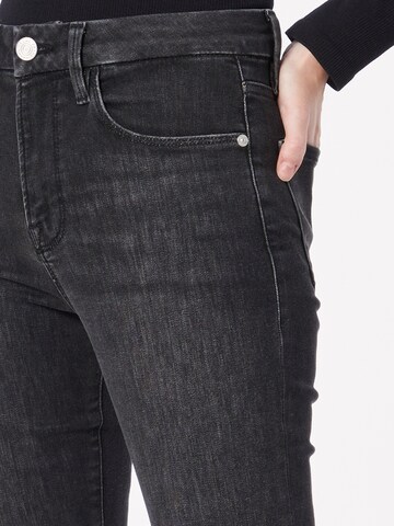 FRAME Bootcut Farkut värissä musta