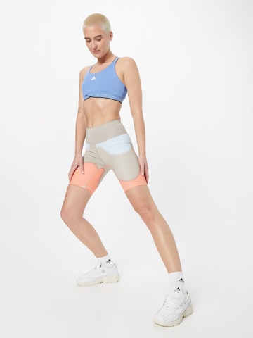 Skinny Pantalon de sport 'Marimekko Optime Bike' ADIDAS SPORTSWEAR en bleu