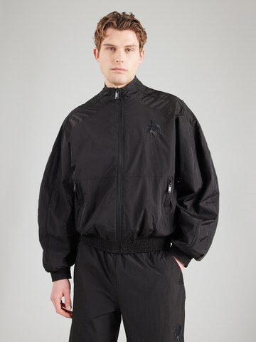 Han Kjøbenhavn Between-season jacket in Black: front