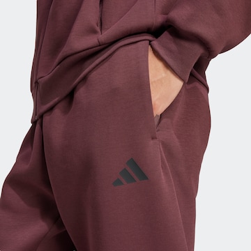 Tapered Pantaloni sportivi 'FI' di ADIDAS SPORTSWEAR in rosso
