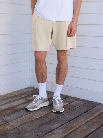 regular Pantaloni di Next in beige
