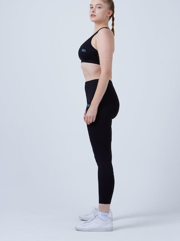 SPORTKIND - Slimfit Pantalón deportivo 'Long Leggings with Pockets' en negro