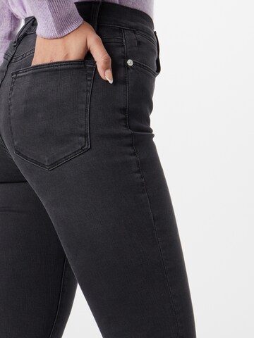 FRAME Flared Jeans in Schwarz