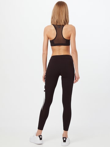 PUMA Skinny Sportbroek in Zwart