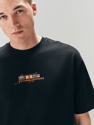 T-Shirt Next en noir