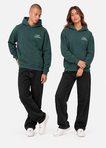 Loyal Athletics by Kontra K Hoodie Paint in  Loose Fit in Grün: Vorderseite