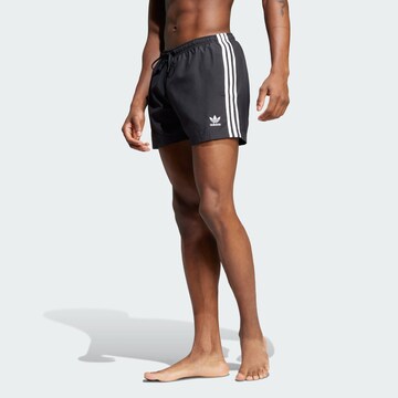 ADIDAS ORIGINALS Swimming shorts 'Adicolor' in Black: front