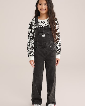 Loosefit Pantaloni con pettorina di WE Fashion in nero: frontale