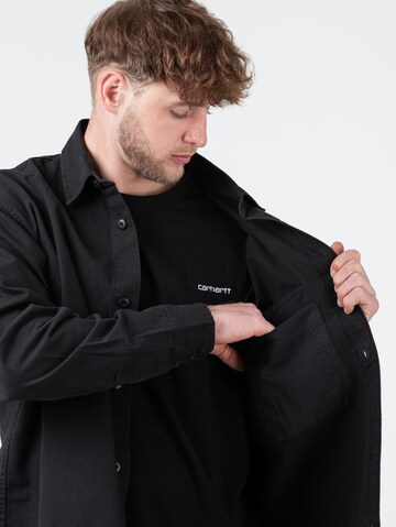 Carhartt WIP Jacke 'Reno' in Schwarz