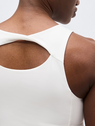 PUMA Top sportowy 'SUNDAY BLISS' w kolorze biały