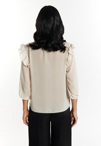 Camicia da donna di faina in bianco