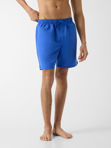 GUESS - Bermudas en azul: frente