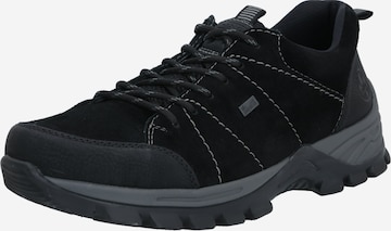 Chaussure de sport à lacets Rieker en noir : devant