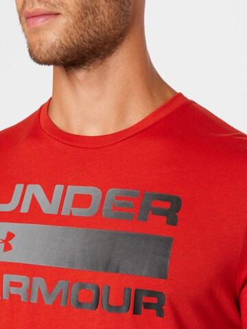 UNDER ARMOUR Funkcionalna majica 'Team Issue' | oranžna barva
