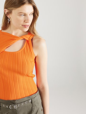 Top in maglia di DKNY in arancione