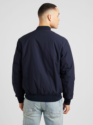 Champion Authentic Athletic Apparel Between-Season Jacket 'Legacy' in Blue