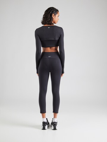 Skinny Pantaloni sportivi 'LUX' di Reebok in nero