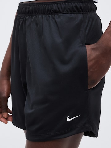 NIKE Loosefit Sportnadrágok 'ONE' - fekete