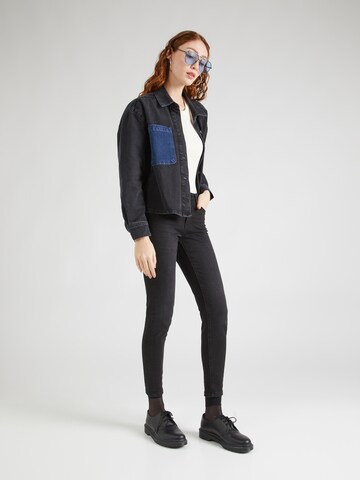 Skinny Jeans di Springfield in nero