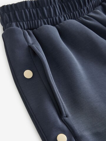 Next - Pierna ancha Pantalón en azul