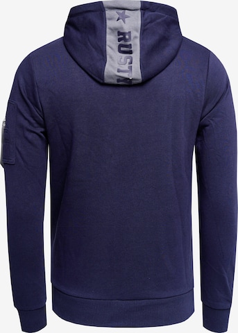 Rusty Neal Zip-Up Hoodie in Blue