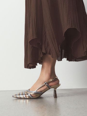 Next Slingpumps i guld