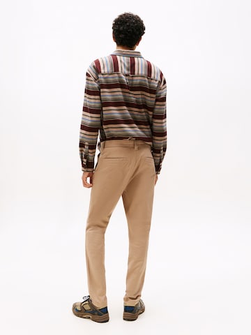 Regular Pantalon chino 'AUSTIN' Tommy Jeans en gris