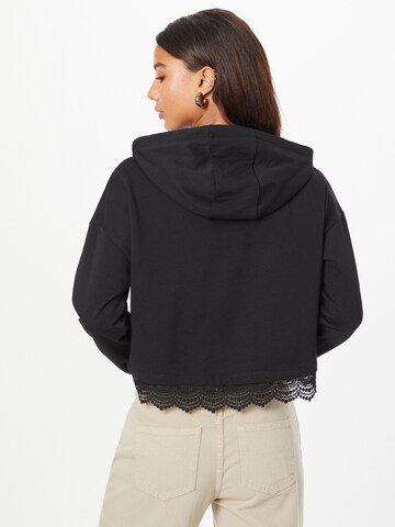 ABOUT YOU Sweatshirt 'Letizia' in Zwart