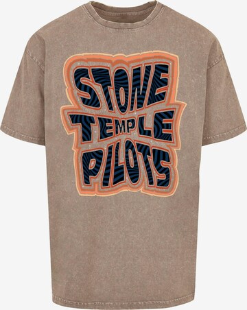 Merchcode T-Shirt 'Stone Temple Pilots' in Grün: predná strana