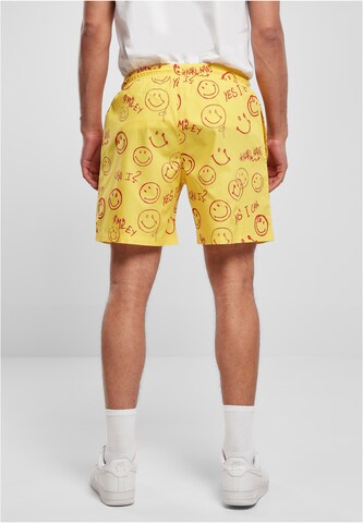 Karl Kani Loose fit Pants in Yellow