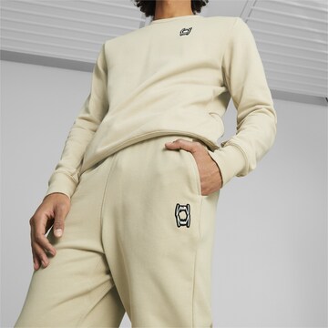 Regular Pantalon de sport 'Pivot' PUMA en beige