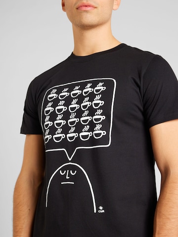 T-Shirt 'Stockholm Coffee Mind' DEDICATED. en noir