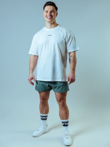 Coupe slim Pantalon de sport 'Raw Gym Shorts - Short Cut' Lifters en vert
