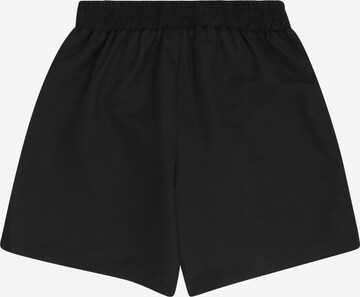Pantaloncini da bagno di DKNY in nero
