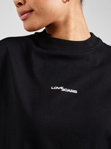 Love Scars T-Shirt in Schwarz