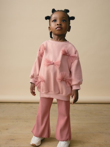 Set Next en rose : devant