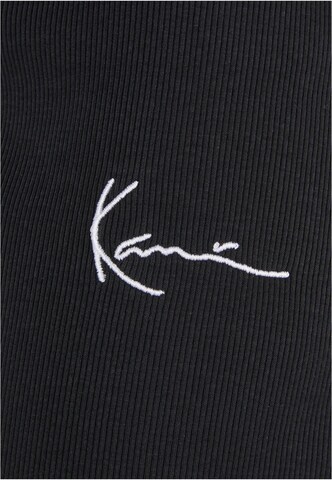 évasé Pantalon Karl Kani en noir