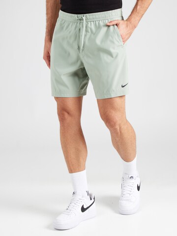 Regular Pantalon de sport 'FORM' NIKE en vert : devant