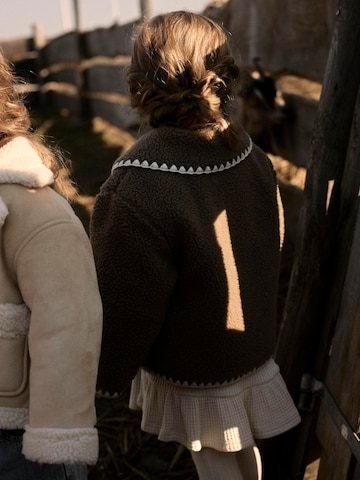 Lil'Atelier Tussenjas in Bruin