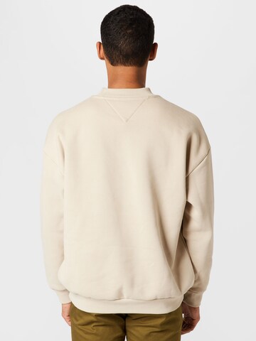 Felpa di Tommy Jeans in beige