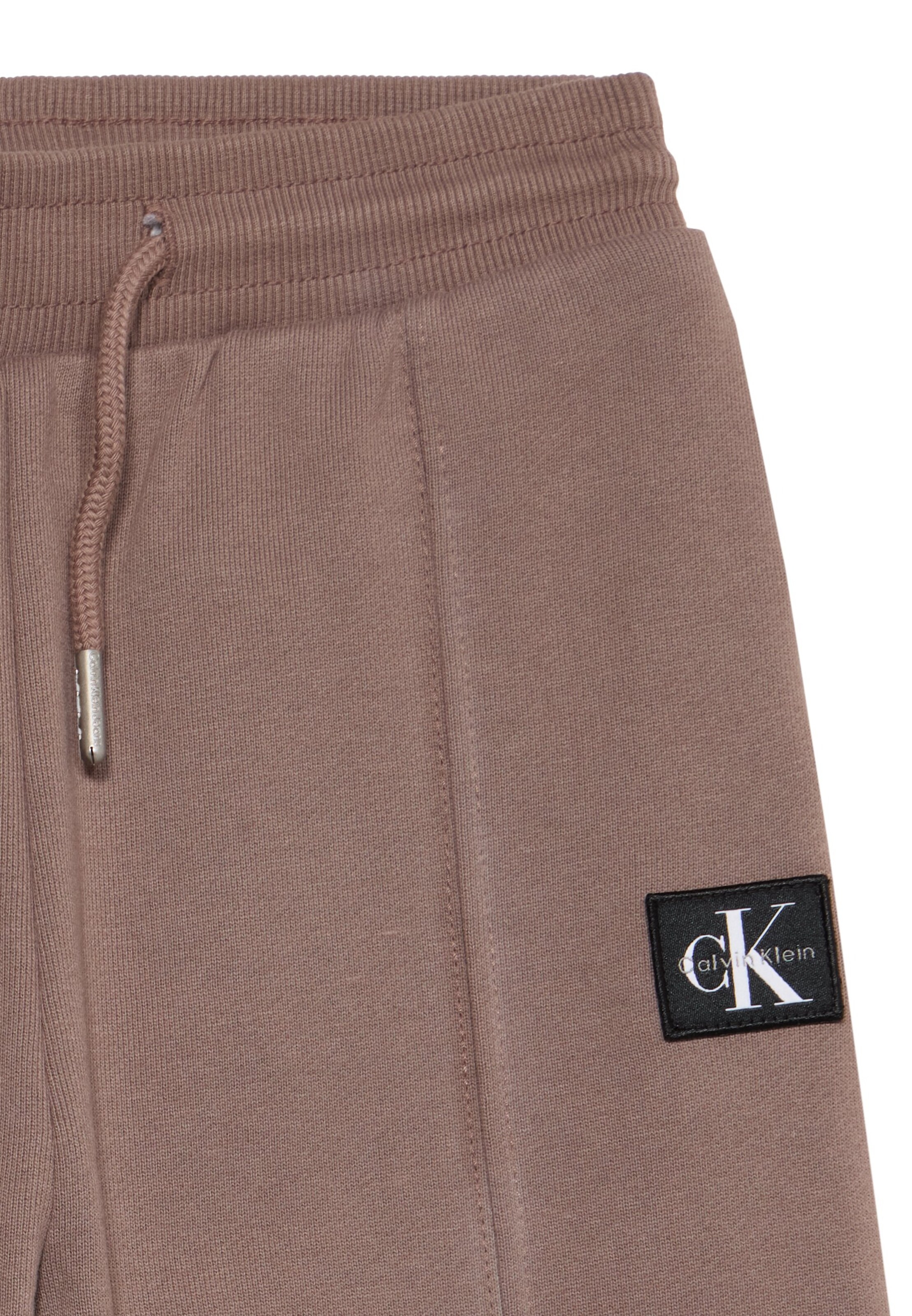 Calvin Klein Jeans Zúžený Kalhoty – hnědá