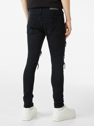 Skinny Jeans di Bershka in nero